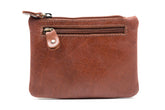 A closed three zip purse in soft tan Irish leather.